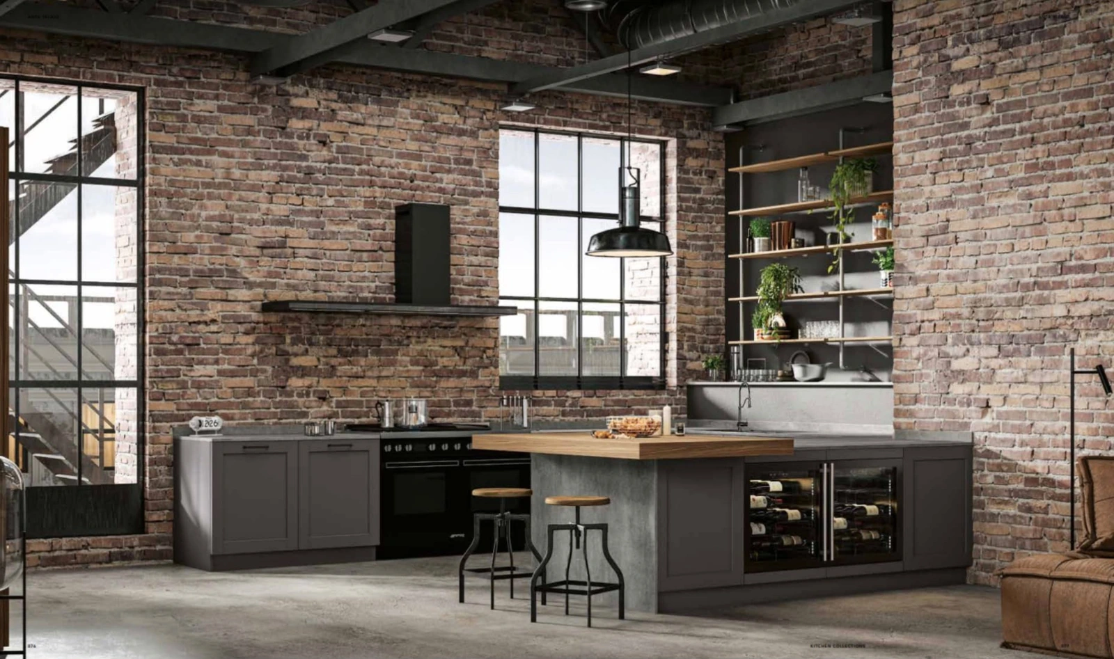 Cucina scura con isola in un ambiente dal carattere industriale