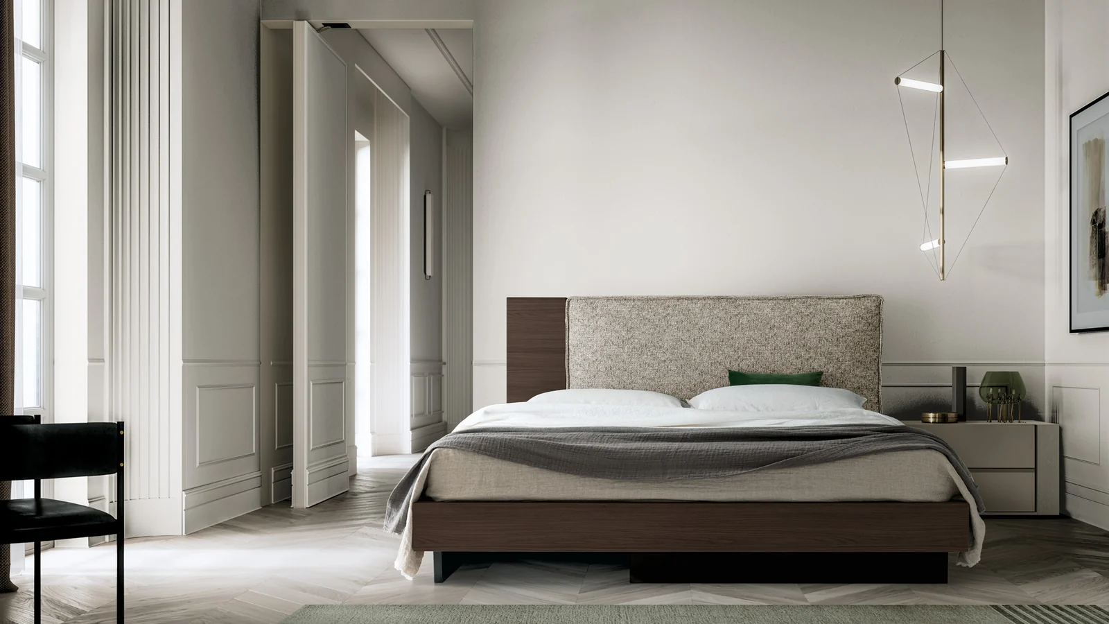 Camera Santalucia con letto Plinio e testiera tessile in un ambiente luminoso